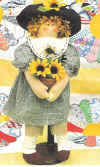 Sunflower Suzie.  Pattern includes 20" rag doll with easy to make hair of 4 different colors of yarn.