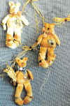Hang Ups.  Pattern includes 10" cat, pig and cow hanging with wire.