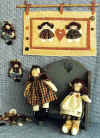 Friends.  Little by little, day by day  flowers and friendships grow that way.  Pattern includes 10" doll and raggedy Ann doll; 4" doll pin and 8" x 13" mini quilt with easy applique.